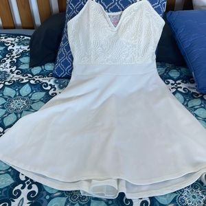 White above knee length dress.